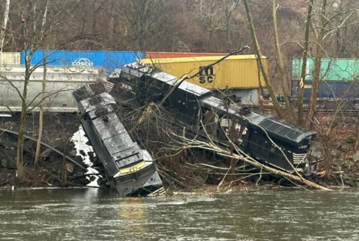 The scene of the two locomotive partially in the Lehigh River following the head-on collision and derailement.&nbsp;
