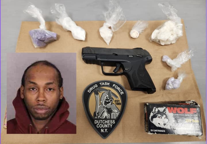 Tyrone A. Moye and the drugs and guns seized during the raid.&nbsp;