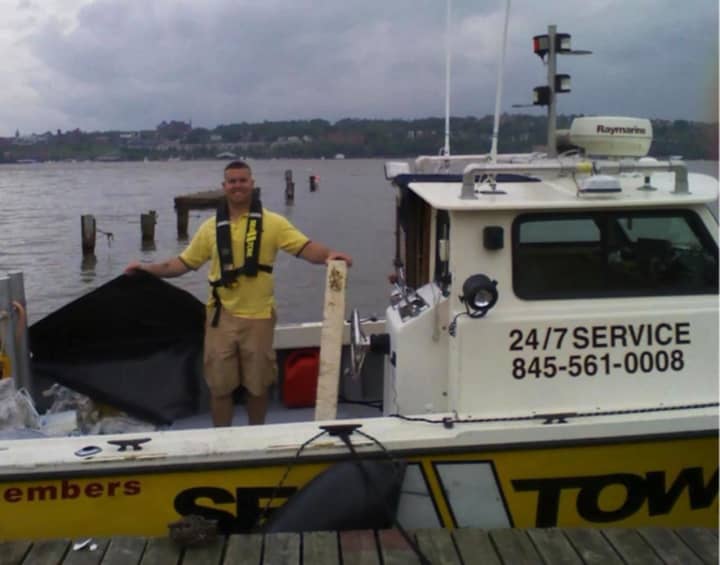 A ship from Sea-Tow Central Hudson helped remove a seven-foot tractor tire from the Hudson River.