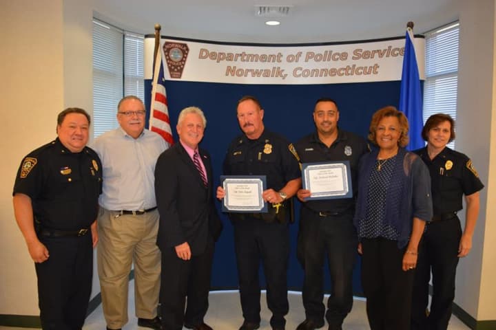 From left, Deputy Chief Gonzalez, Commissioner Charles Yost, Mayor Harry W. Rilling, Sgt. Peter LaPak and Officer Richard Delallo, Commissioner FranCollier-Clemmons and Deputy Chief Susan Zecca.