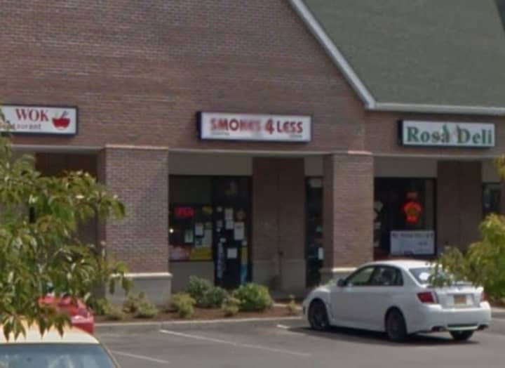 Smokes 4 Less, a LaGrangeville store that sells tobacco, cigars and smoking accessories, was robbed by a baseball-bat wielding suspect Tuesday, police say.