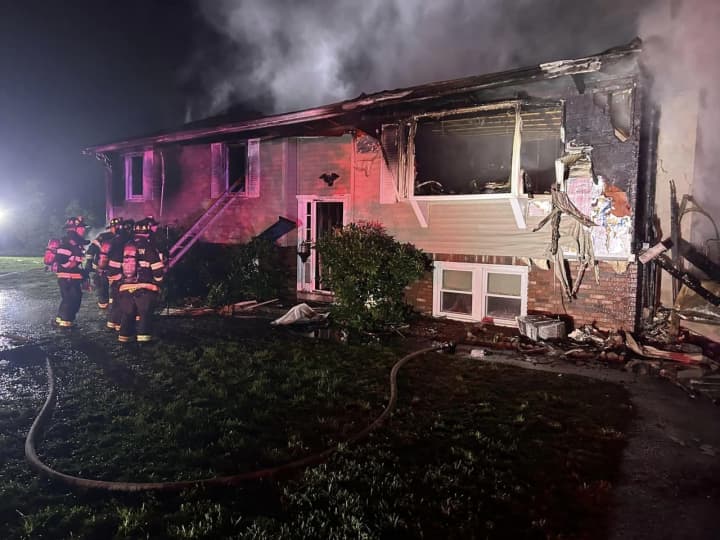 A fire at 45 Chace Hill Road in Sterling destroyed the home and cars parked outside. A fundraiser for the St. Thomas family who lived there hopes to help them rebuild.