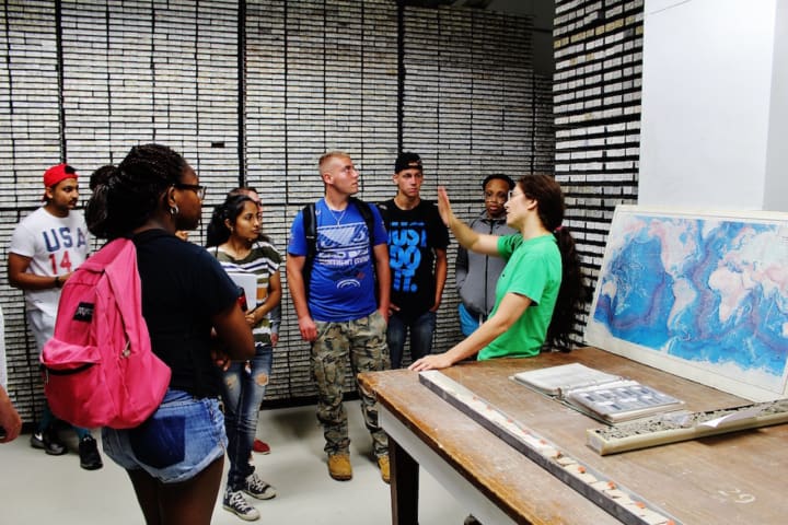 Students are given a tour of the core repository at Lamont-Doherty Earth Observatory, which houses thousands of core samples.