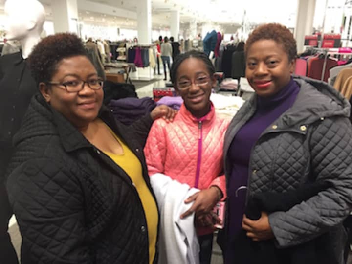 From left, Marjorie Cius, her daughter Aisha, and Marjorie&#x27;s sister Myda Jean Paul took advantage of sales at Lord &amp; Taylor Thursday.