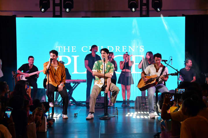 The Jonas Brothers perform at the American Dream Mall to kick off the voting phase of the &quot;Best School Day Ever Contest&quot; hosted by The Children&#x27;s Place on Aug. 10.