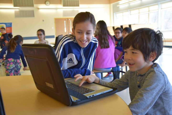 Fifth-grade students at Todd Elementary school in Briarcliff Manor used their coding skills to create digital stories for kindergarten students to interact and play with as part of the school’s initiative to involve students in coding at an early age