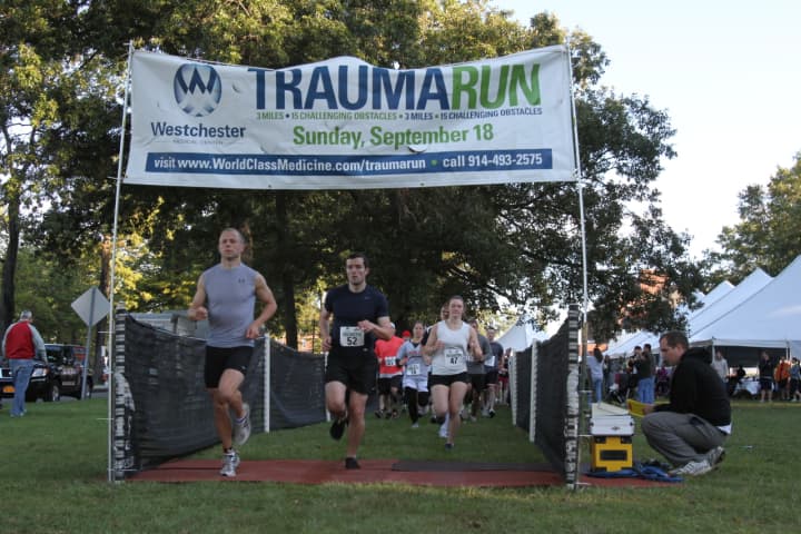 Runners hustle off of the starting line at the Evan Lieberman Trauma Run.