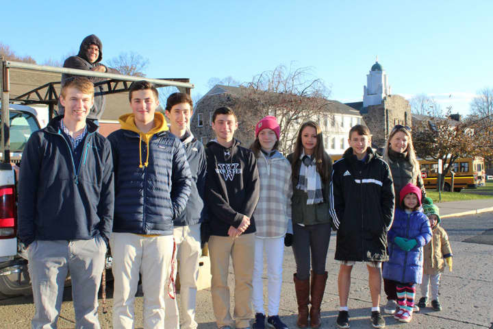 Students at Wooster School in Danbury loaded up a truck with more than 100 donated turkeys and delivered it to the Daily Bread food pantry on Monday