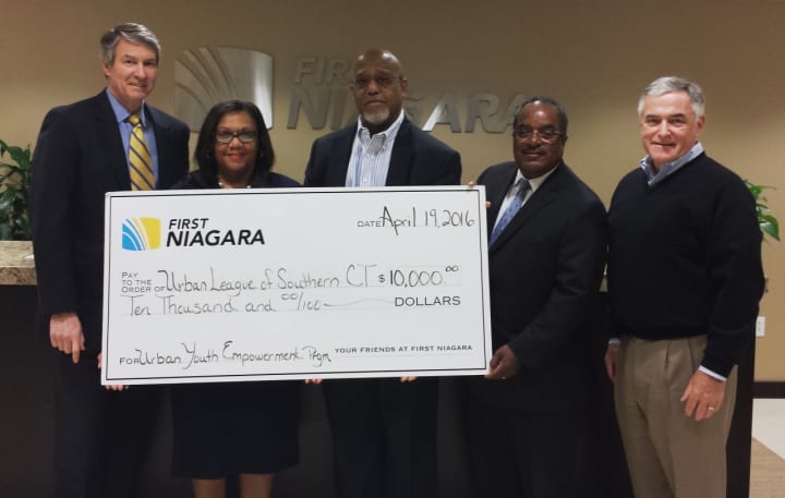 First Niagara leaders present the Urban League of Southern Connecticut with a $10,000 donation to support the Urban Youth Empowerment Program.