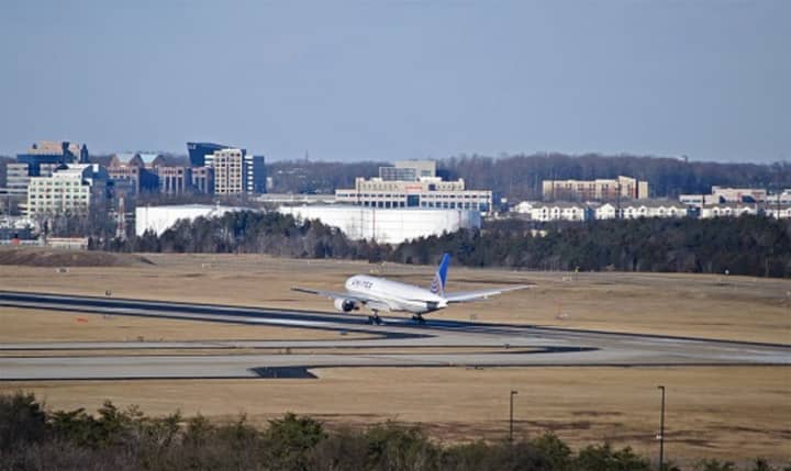 A United Airlines jet lands at Dulles International Airport in Virginia.