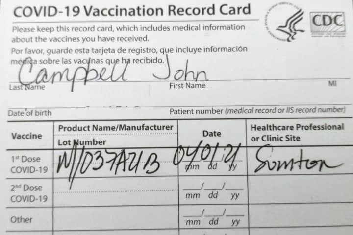 A CDC COVID-19 Vaccination Record Card