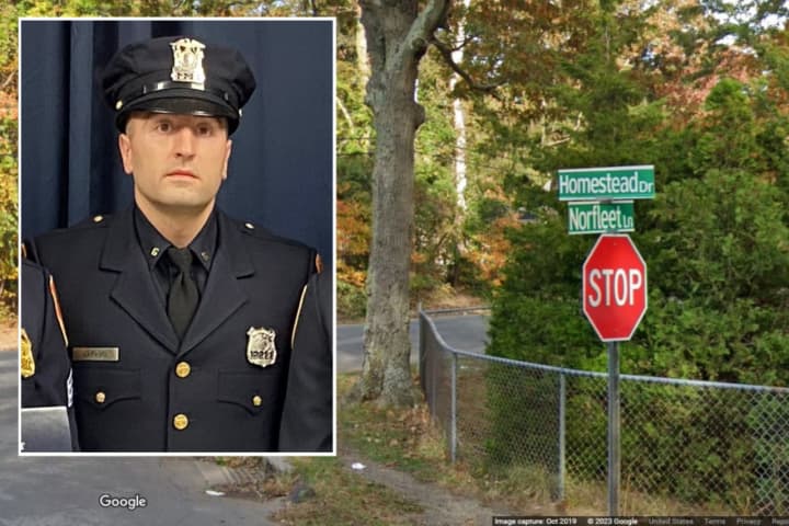 Suffolk County Police Officer Michael Lafauci was shot while investigating an armed robbery at a home in Coram on Thursday, May 11.