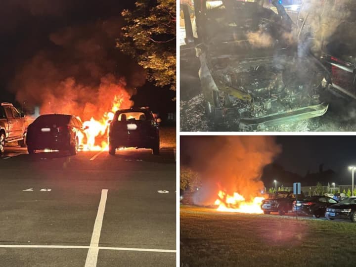 Two vehicles were engulfed in flames at the parking lot of the EF Academy in Thornwood.