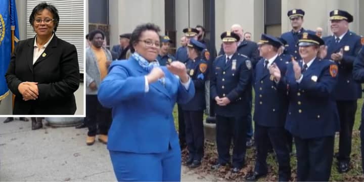 Former&nbsp;Suffolk County Police Deputy Commissioner Risco Mention-Lewis dances during a retirement send-off outside the agency's Yaphank headquarters on Wednesday, Jan. 10.