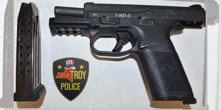 One of three loaded handguns that Troy Police reportedly found on the suspects.&nbsp;