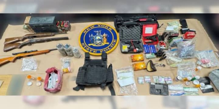 Drugs and weapons that were allegedly seized from a Greenport home on Thursday, March 28.&nbsp;
