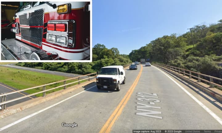 Route 312 in the town of Southeast has been closed in both directions at its intersection with I-84 following a fire.