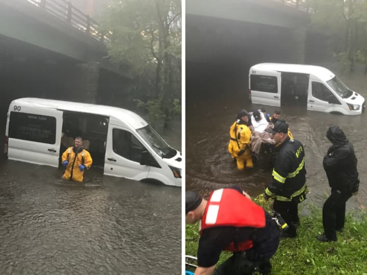 A disabled patient and two caregivers had to be rescued from a submerged ambulette that had become stuck on the flooded Bronx River Parkway in White Plains, authorities said.