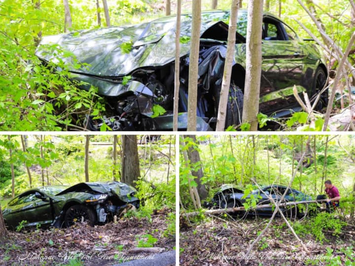 A car crashed down into an embankment on Hill Street in Mahopac, requiring the road to be briefly closed while the vehicle was removed.