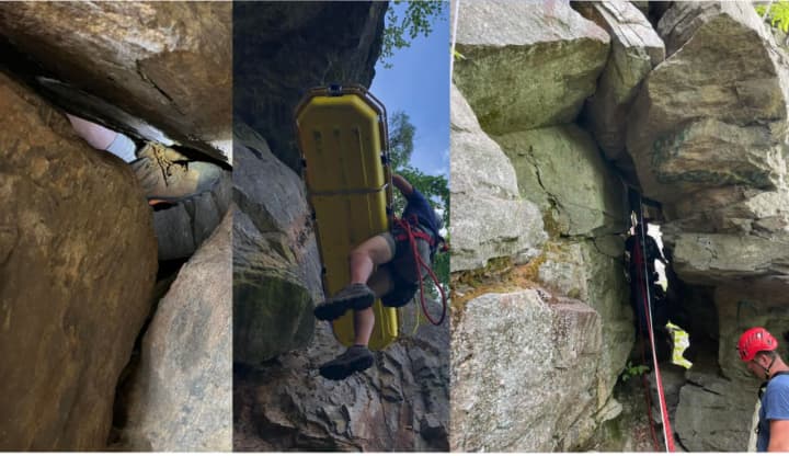 A rock climber was rescued after his foot and leg became stuck on a cliff.