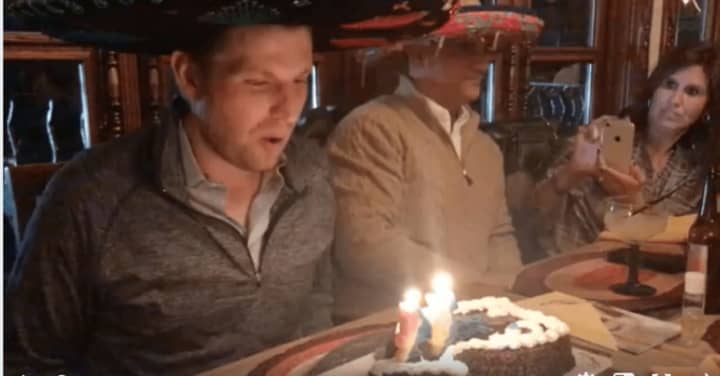 Eric Trump blows out his birthday candles at Guadalajara in Briarcliff.