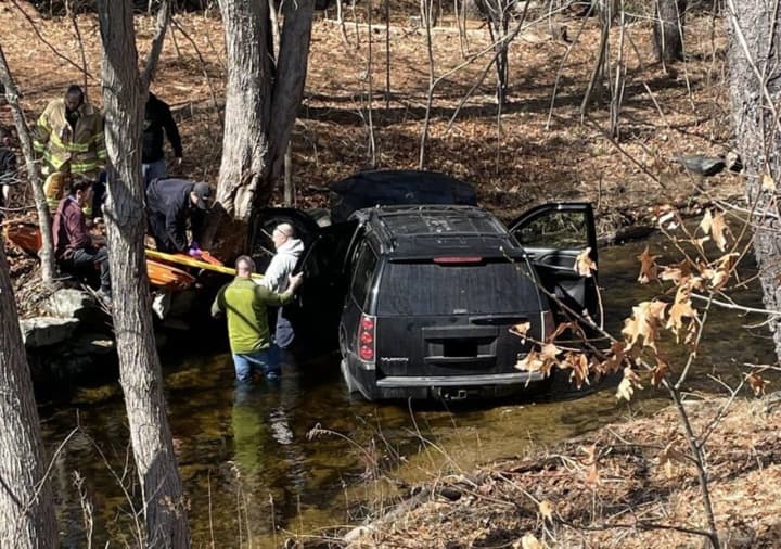 An SUV drove off Mendon Street on Wednesday, March 22, and crashed into a river after the driver suffered a medical episode, police said.