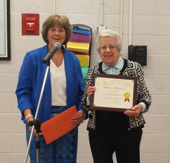 Photo caption: Lillian Spiegler (right) stands with Valhalla Superintendent Brenda Myers. Spiegler, a 100-year-old volunteer, was recognized with a special honor from the Valhalla Board of Education.