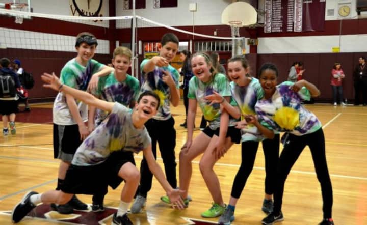 Students in handmade T-shirts at Valhalla Middle School competed with one another in a volleyball tournament to support the Ulman Cancer Fund for young adults with cancer.
