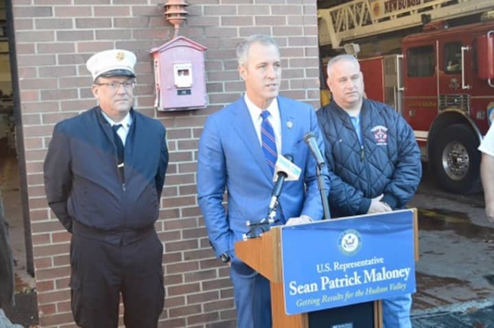 Former Newburgh Fire Chief Michael Vatter, left, is pictured with U.S Rep. Sean Patrick Maloney, center, and an unidentified man last fall at the firehouse. Maloney was announcing the securing of FEMA funds for the Fire Department.