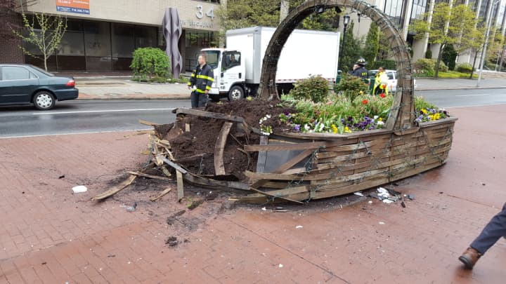 This boat-sized flower basket, donated to the City of White Plains 25 years ago, was heavily damaged on Wednesday during a car accident at the corner of South Broadway and Armory Place.