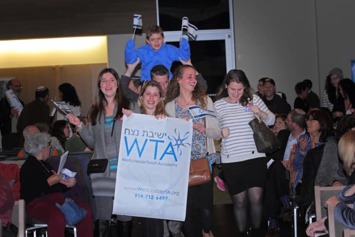 Students and staff from Westchester Torah Academy (WTA), one of 60 partnering organizations for “An Evening of Unity with the People of Israel,” march proudly in support of Israel.