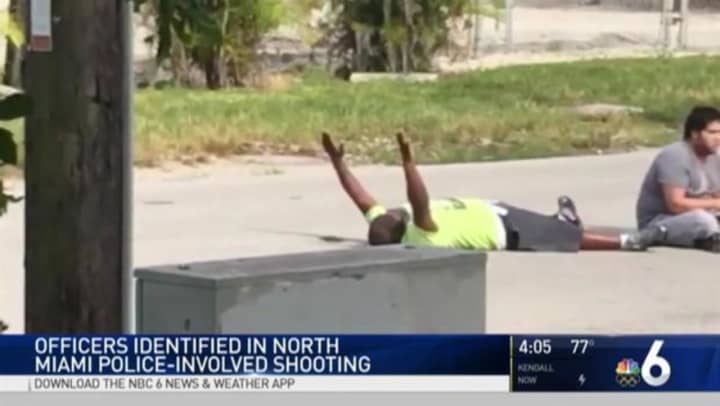 A screenshot shows behavior therapist Charles Kinsey as he was lying in the street with his hands in the air before he was shot by a North Miami police officer, who is originally from Westport.