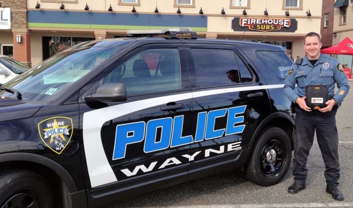 Firehouse Subs presented the Wayne Police Department with defibrillators at a ceremony in Totowa.