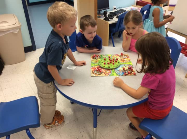 Preschoolers at Goddard School are testing new toys for the holiday season.