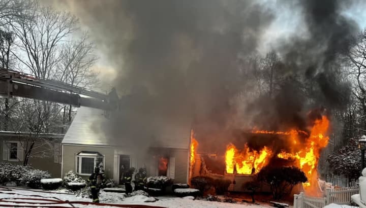 Westborough firefighters asked drivers to avoid the intersection of Adams Street at Orchard Hill Drive as they battle a house fire on Friday, Feb. 24.