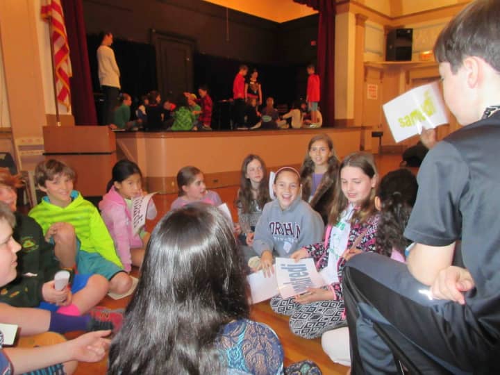 Main Street School fifth-graders teamed up with Irvington Middle School teachers and sixth-graders on March 24 for a day of educational activities at the annual World Language Fair.