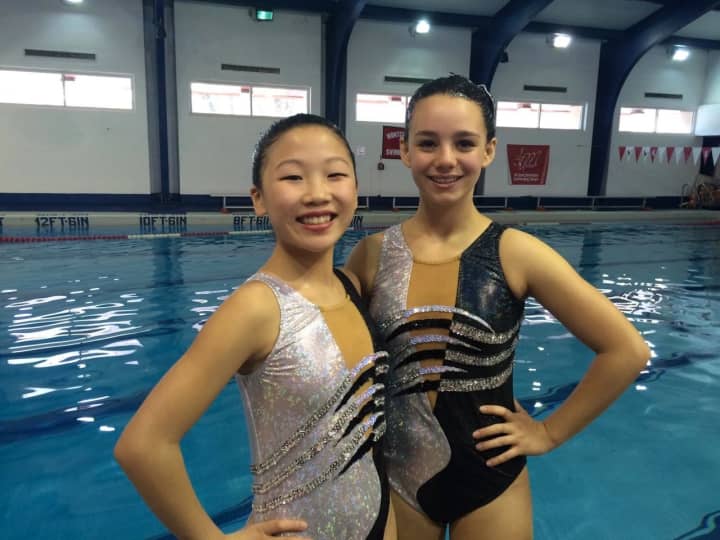 Isabel Rhee, left, and Abigail Recchia won first place in the 13 and over Duet in the NJ Association meet at Montclair State University and at the Region B Championship in Phoenixville, Pa.