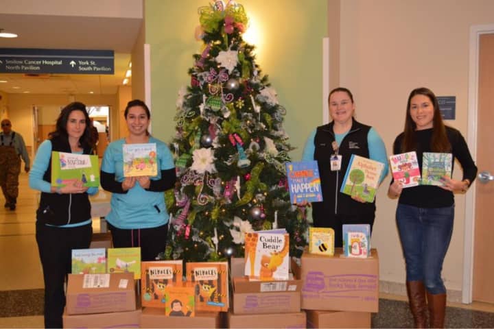 Fairfield teacher Kristin Golia raised about $3,500 to support a book drive for children with cancer at Yale-New Haven Hospital.