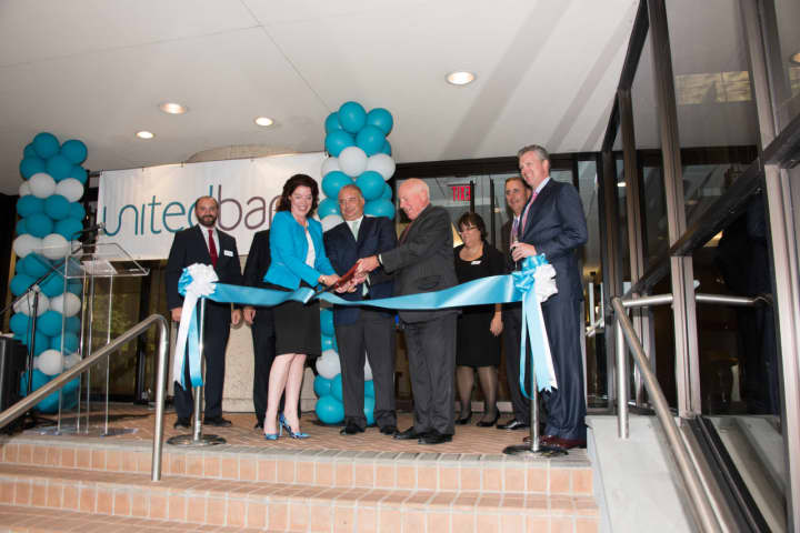 Ribbon Cutting, left to right: Maureen Hanley-Bellitto, senior vice president of commercial lending; Bill Crawford, CEO; and Jim Marpe, First Selectman of Westport. 