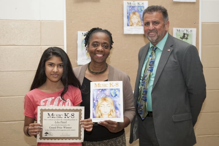 Left to Right Grand Prize Winner Lila Patel, Lynda Hayes (Music Teacher), Frank Scarafile (Superintendent)