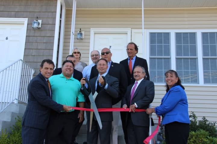 Westchester County Executive Rob Astorino cuts the ribbons on the county&#x27;s newest affordable housing unit.