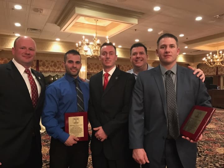 From left to right are: Westport Police Capt. Ryan Paulsson, Officer David Scinto, Officer Brendan Fearon, Capt. David Farrell and Officer Samuel Sabin. Scinto and Sabin received Meritorious Service honors for life-saving police work.
