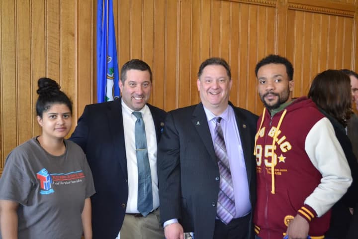 State Rep. Mitch Bolinsky (second from right) celebrates Autism Awareness Day with State Rep. Jay Case (R-63) and advocates.