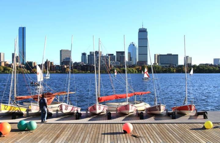 A view of the Boston skyline from a boating dock on the Charles River