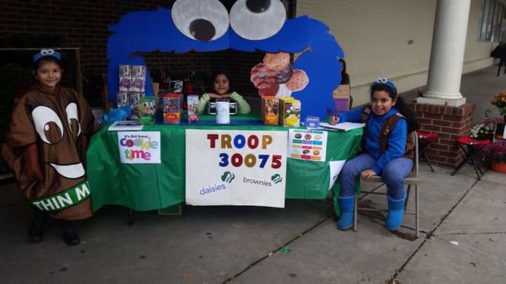 Girl Scouts sell cookies on Election Day. 