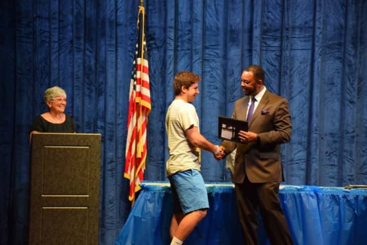 A student accepts an award during Monday&#x27;s awards night at Bronxville High School.