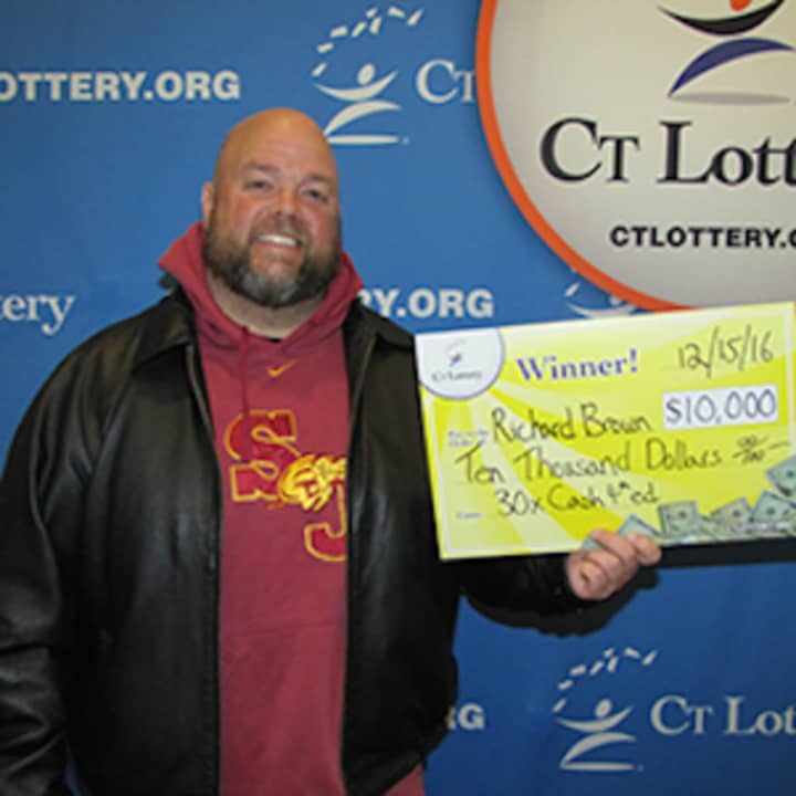 Richard Brown of Stratford with his lottery prize.