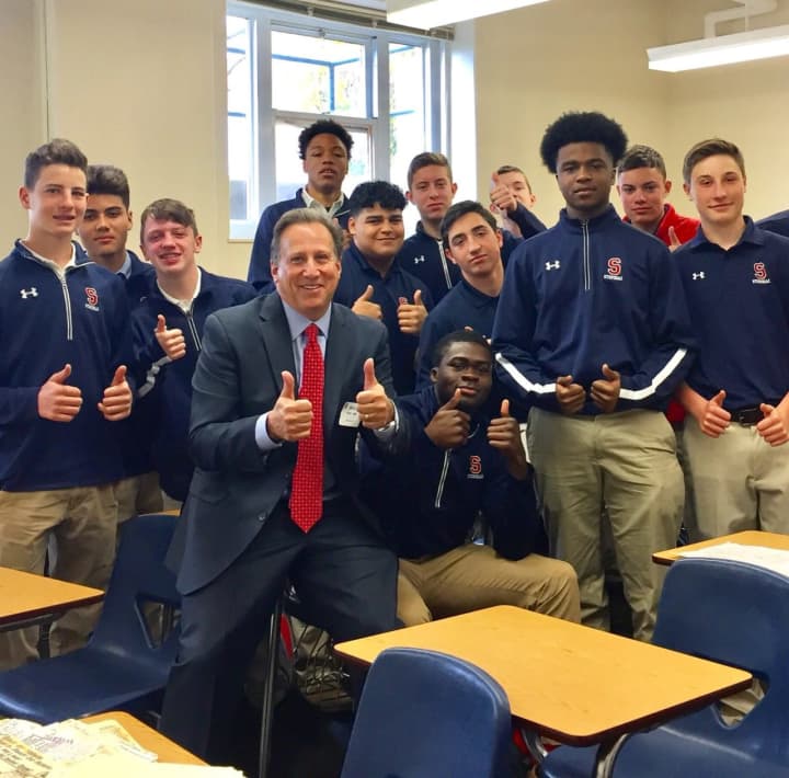 Bruce Beck poses with Stepinac students.