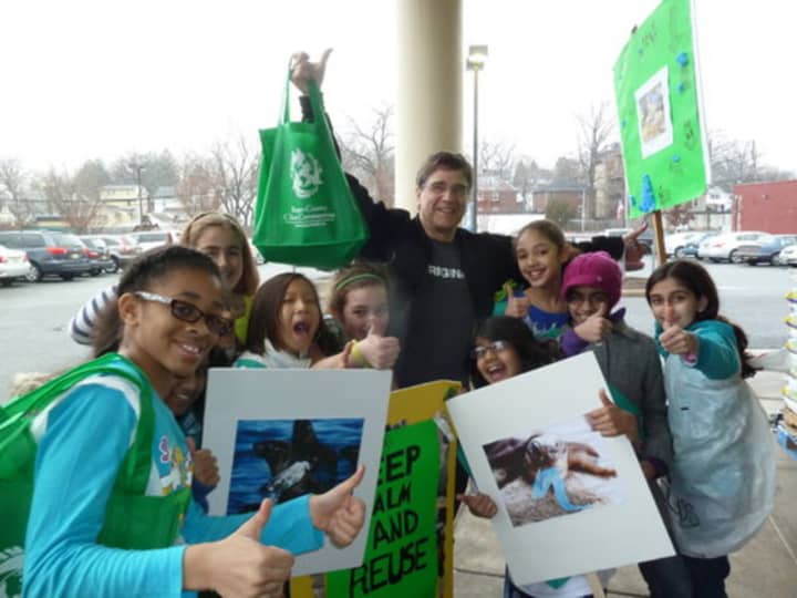 Girl Scout Troop 19 members with supporter Bruce Prince, owner of Teaneck General Store.