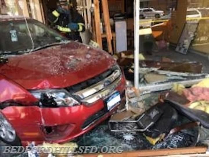 A car slammed into the Cambareri Building on Bedford Road causing major damage.